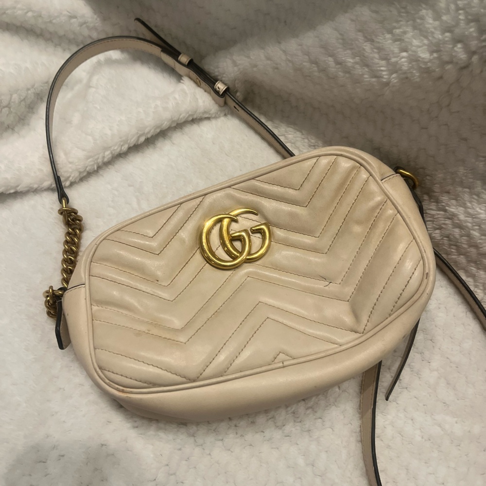 Gucci Cream Crossbody Bag with Luxurious Design-just needs a good clean up .